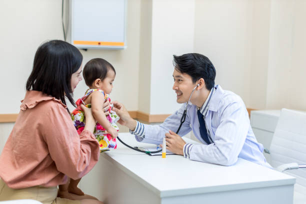 istock baby being checked by a doctor using a stethoscope. Pediatrician doctor prepare for examines baby with stethoscope checking heart beat. 1397371409
