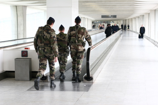3 military people at the airport of paris (safety security patrol)