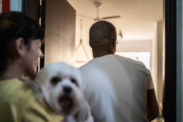 istock Young couple entering at home 1397373688