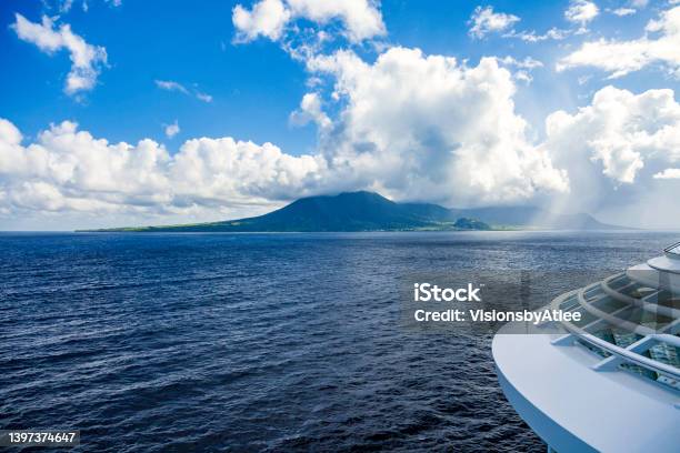 View From Our Cruise Ship As We Pass By Cloudshrouded Mountains While Approaching The Caribbean Islands Of St Kitts And Nevis Stock Photo - Download Image Now