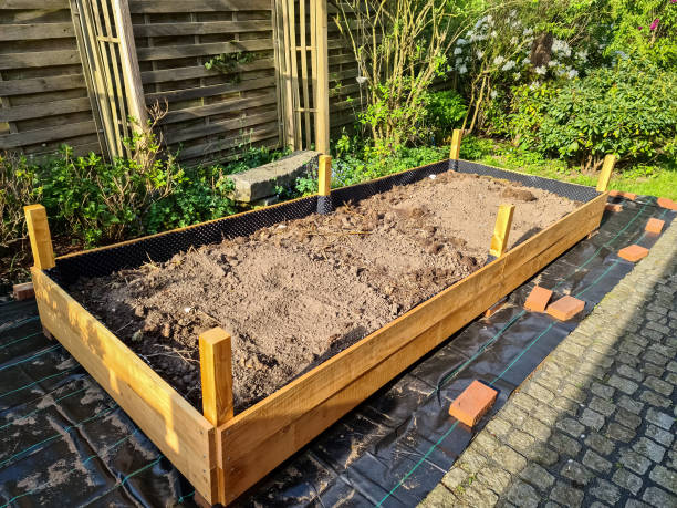 istock Raised herbal bed during construction in a German garden. 1397375880