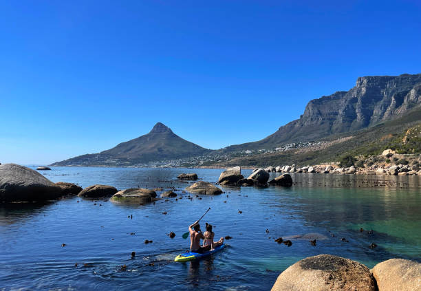 Aerial view of Clifton Beach and Camps Bay and Table Mountain, as tourists enjoy the sights in the city of Cape Town, South Africa. More than two years after the pandemic and strict lockdown which saw travel bans placed on South Africa, international travel has seen a recovery of 76% in Cape Town and domestic by 75% with 27 000 passengers pass through airports last weekend.