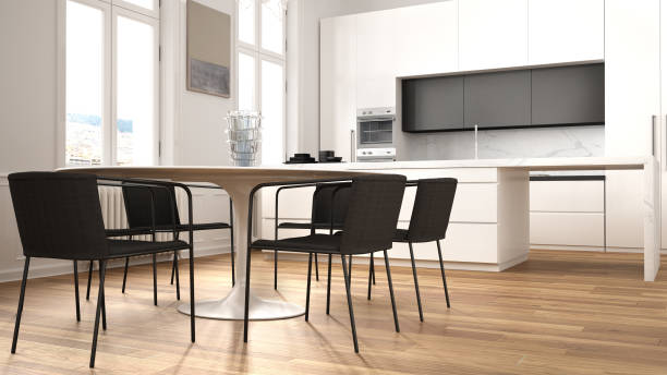 istock Minimalist white and black kitchen in classic room with moldings, parquet floor, dining table with chairs, marble island and panoramic windows. Modern architecture interior design 1397379546