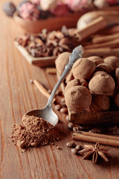 istock Chocolate truffles on a wooden table. 1397379909