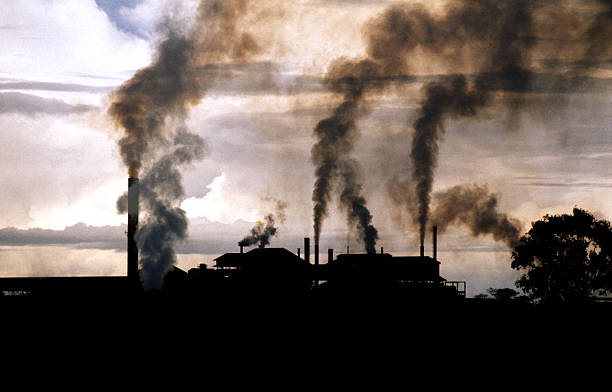 World's worst pollution This photograph was taken in Kabwe, Zambia, one of the world's 10 most polluted places (according to the Blacksmith Institute). It shows pollution pouring from the lead and zinc smelting plant in the days when that plant was operational. lead mine stock pictures, royalty-free photos & images