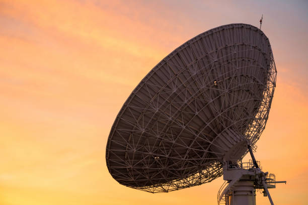 istock Huge Satellite Dish in evening twilight sky at sunset 1397389427
