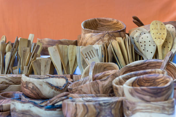 istock Beautiful handmade wooden tableware exhibited at a craft fair. 1397391347