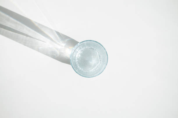istock Glass of water on a white background. Top view, flat lay. 1397391448
