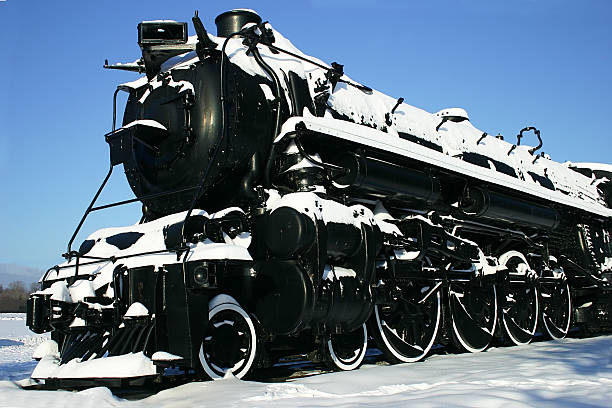 istock Old Locomotive Covered with Snow 139739358