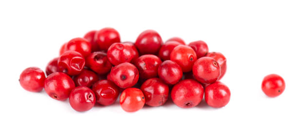 istock Pink peppercorns isolated on white background. Dry red pepper grain. Organic spice. 1397394590
