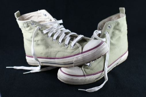 canvas hightop sneakers untied