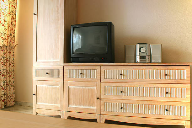 istock tv and hifi on cabinets 139739757