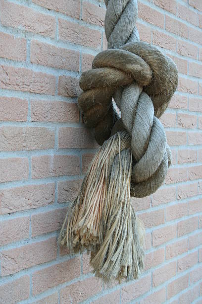 узлом рисунком - rope frayed breaking tied knot стоковые фото и изображения