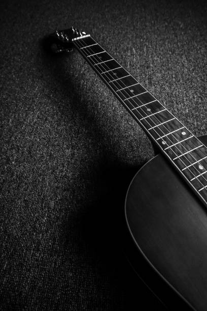 istock Acoustic guitar in black and white 1397397601