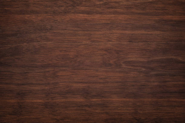 ciemne drewniane tło. brązowa faktura na desce, mahoniowy wzór - mahoń zdjęcia i obrazy z banku zdjęć