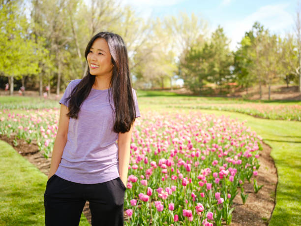 istock Woman Walking in a Park 1397401340