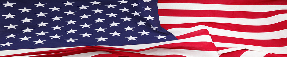 American flag with VOTE theme. USA flag with voting and election theme words overlaid. Conceptual image.