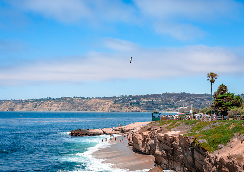 La Jolla, CA, USA - July 24 2015: View of La Jolla Cove, with visitors and swimmers, in the summer.