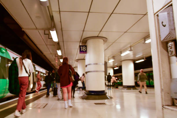 At train platform inside one of the UK's busiest railway stations