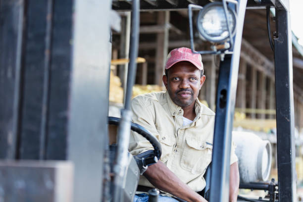 istock African-American man working at lumberyard on forklift 1397409258