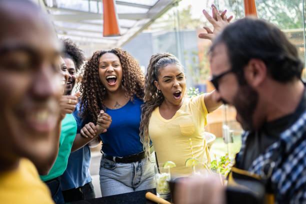 istock Friends celebrating soccer team goal 1397409263