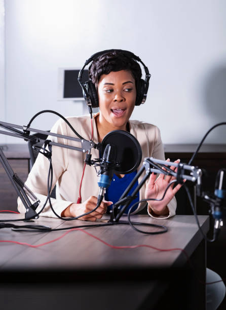 istock African-American woman hosting a podcast 1397410381