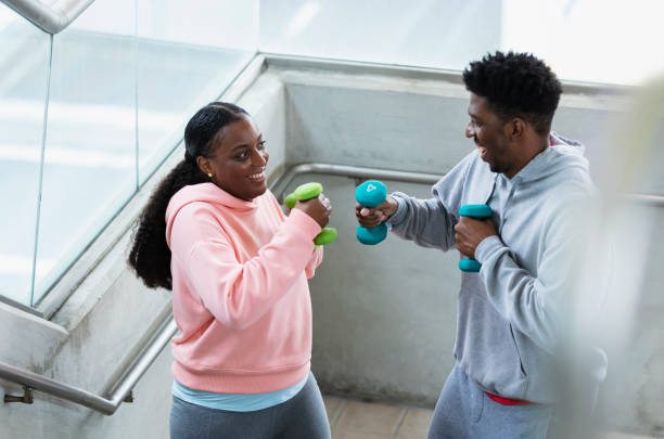 istock African-American couple exercising together 1397411398