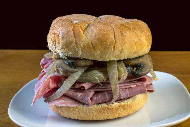 istock corn beef sandwich top with sauteed onions and mushrooms, 1397412493