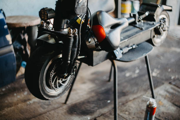 istock Repair of a powerful electric scooter in the workshop garage. 1397413607