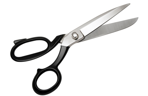 Black handled scissors on a white background. File contains clipping path.