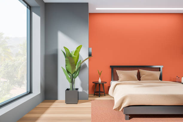 istock Bedroom interior with bed on carpet, plant and panoramic window. Mockup 1397414959