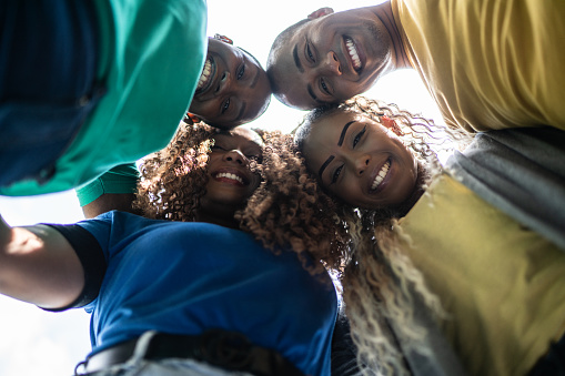 Portrait of friends embracing