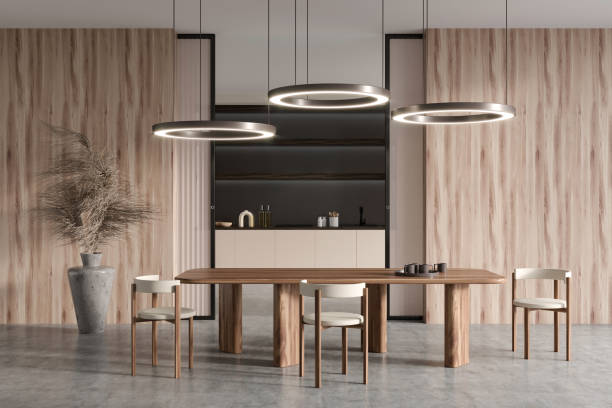 istock Kitchen interior with dining table and seats, cooking space behind doors 1397415702