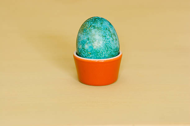 Single blue-green Easter Egg stock photo