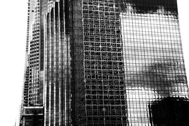 Abstracted wide shot of Los Angeles skyscrapers reflected in the windows of other skyscrapers