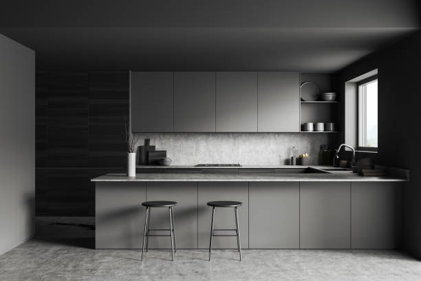istock Grey kitchen interior with island and seats, shelves and kitchenware, window 1397417551