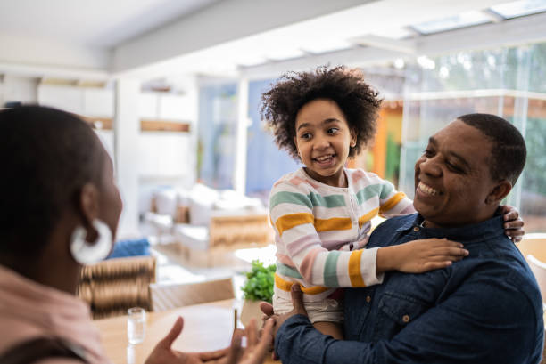 istock Real estate agent talking to father and daughter 1397417766