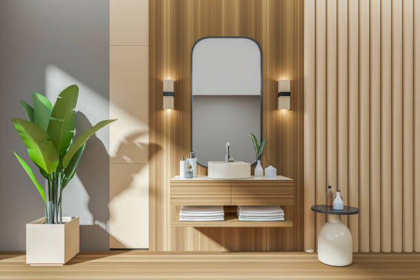 istock Beige bathroom interior with sink and deck, accessories and plant 1397417959