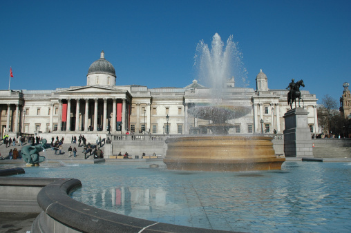 Looking towards the National Gallery in Trafalgar Square, London from one of the fountains.