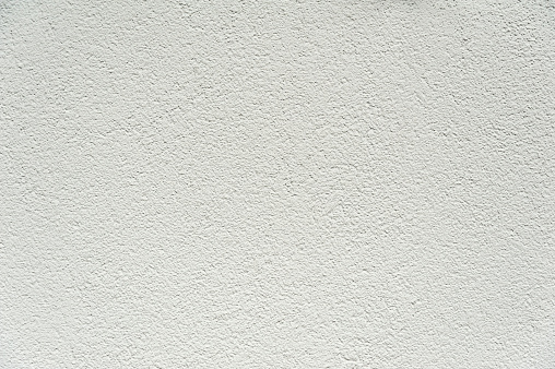 Surface of white rugged wall