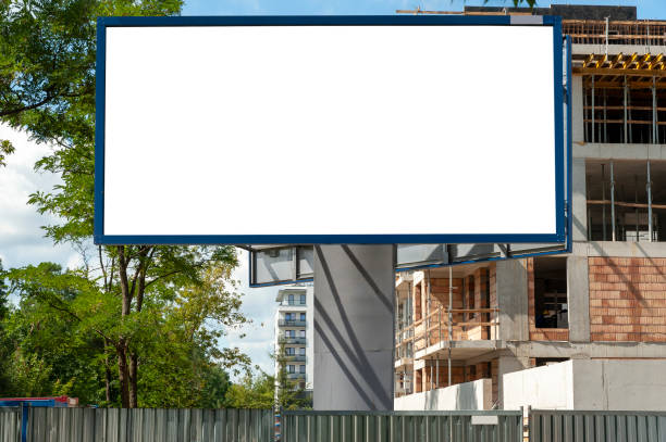 istock Advertising billboard mock-up infront of the construction site 1397420782