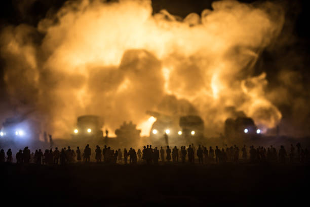 Creative artwork decoration - Russian war in Ukraine concept. Crowd looking on giant explosion and attacking armored vehicles. Selective focus