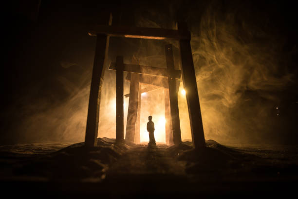 Creative artwork decoration. Abstract Japanese style wooden tunnel at night. Selective focus