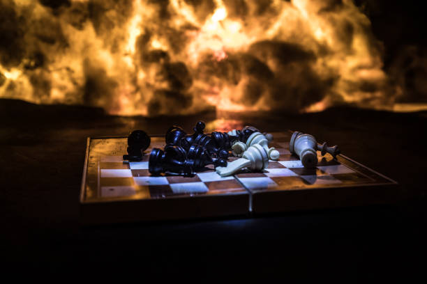 istock Chess board game concept of business ideas and competition and strategy ideas concep. Chess figures on a dark background with smoke and fog. Selective focus 1397420821