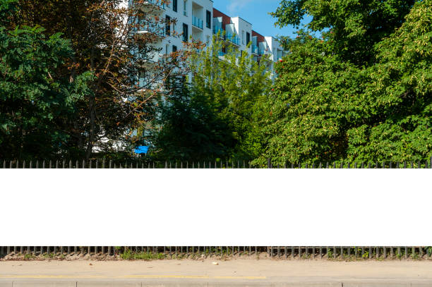 istock Blank white banner for advertisement on the fence 1397421409