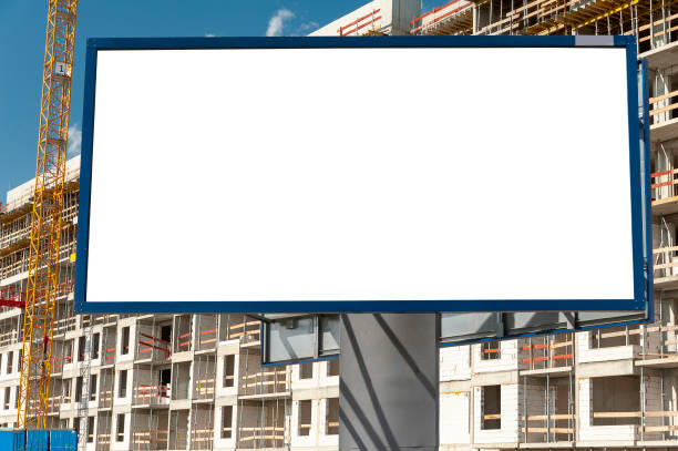 istock Advertising billboard mock-up infront of the construction site 1397421416