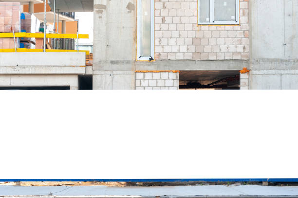 istock Blank white banner for advertisement mounted on the hoardin of construction site 1397421680