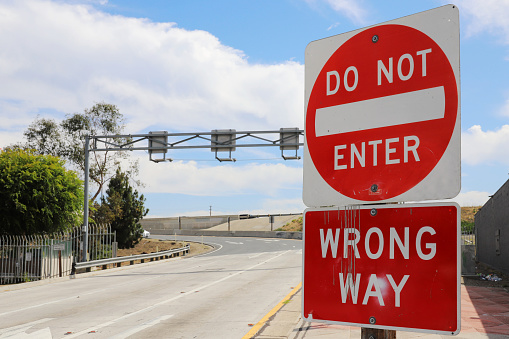 DO NOT ENTER, WRONG WAY Warning Sign at the Exit of Interstate 405, Los Angeles.