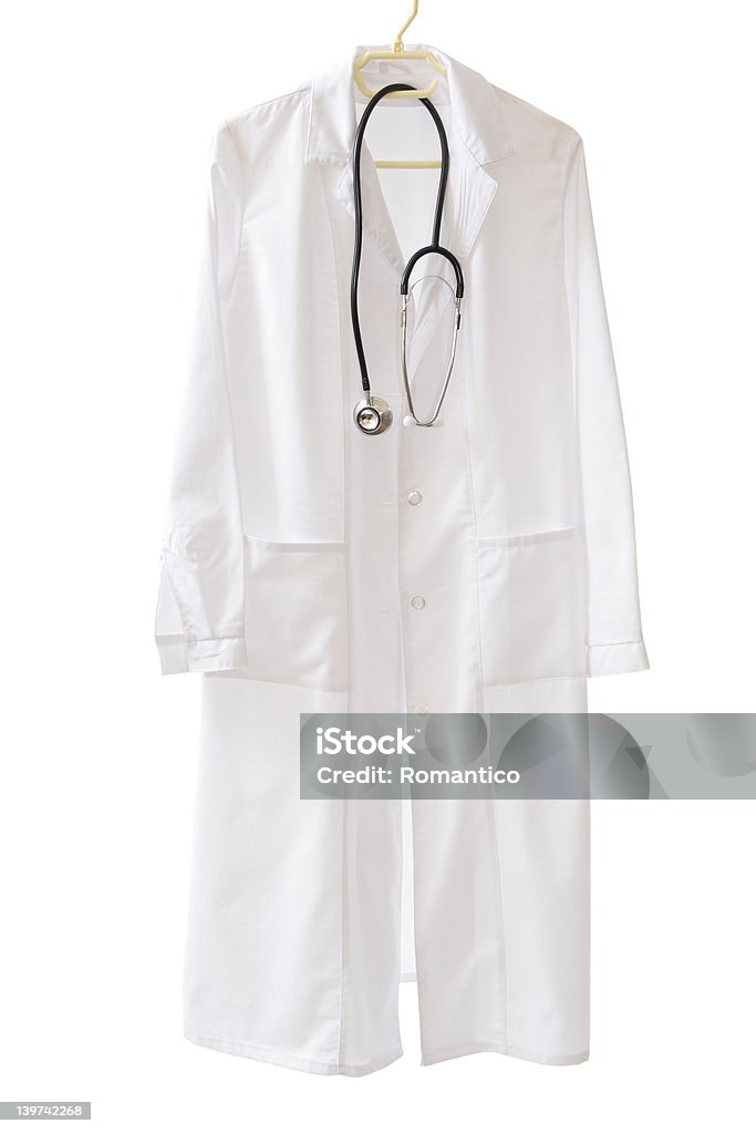 Medical coat ready to go White medical coat isolated on white backgrund ready to put on together with stetoscope Lab Coat Stock Photo