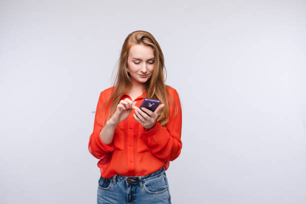 istock Happy woman messaging and texting in phone 1397426995